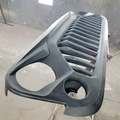 Jeep Wrangler grill prepped for red paint
