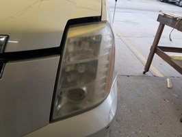 Cadillac Escalade fogged headlights before reclearing