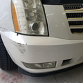 Cadillac Escalade front bumper damage before repair