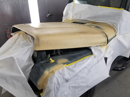 1995 Jeep after priming hood and spot prime other areas