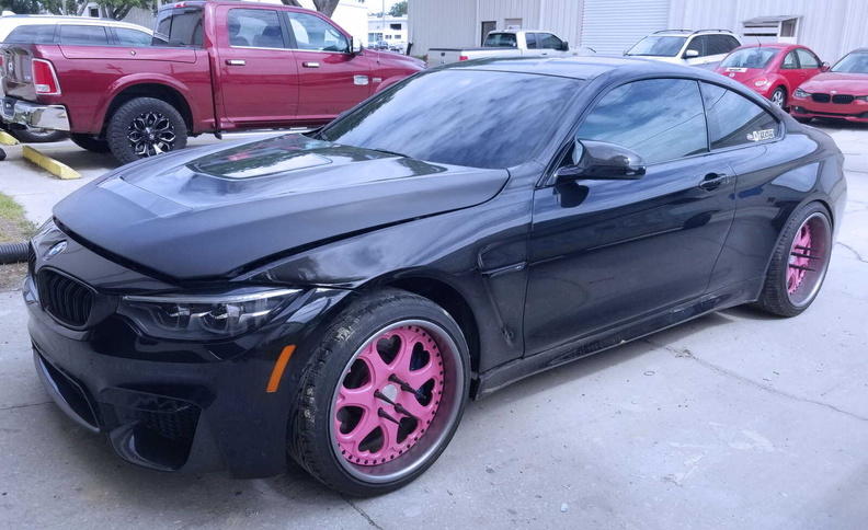 2018 BMW M4 left front side BEFORE prep/paint