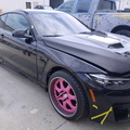 2018 BMW M4 right front side BEFORE prep/paint
