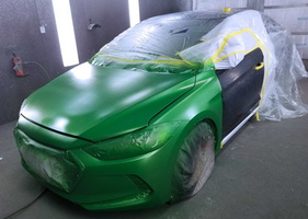 2018 Hyundai Elantra with green metallic paint on front